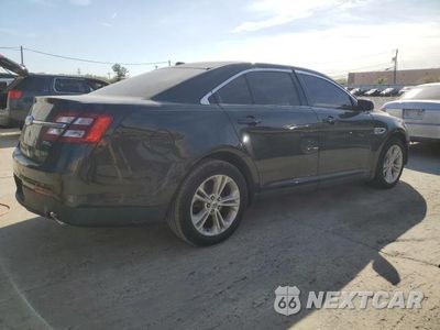Trzecie zdjęcie samochodu z tyłu: 2014 FORD TAURUS SEL VIN:1FAHP2E8XEG158990 - miniatura
