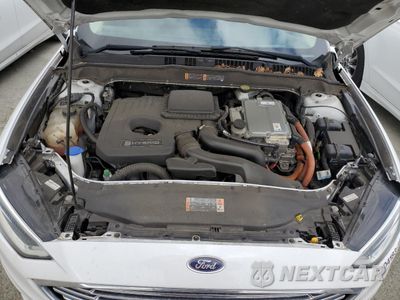 Zdjęcie 11 z 12 samochodu: 2017 FORD FUSION SE HYBRID VIN:3FA6P0LU2HR409364 - miniatura