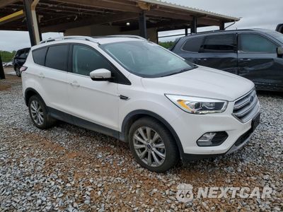 Czwarte zdjęcie samochodu z boku: 2017 FORD ESCAPE TITANIUM VIN:1FMCU0J94HUE29186 - miniatura