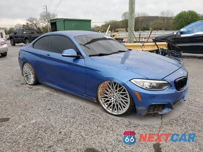 Czwarte zdjęcie samochodu z boku: 2015 BMW 228 I VIN:WBA1F5C57FV256748 - miniatura