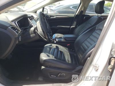 Zdjęcie 7 z 13 samochodu: 2018 FORD FUSION SE HYBRID VIN:3FA6P0LU0JR129836 - miniatura