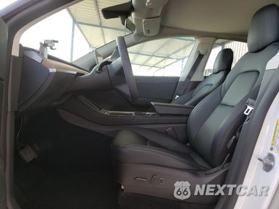 Zdjęcie 7 z 14 samochodu: 2022 TESLA MODEL Y VIN:7SAYGDEE9NF431927 - miniatura