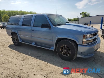 Czwarte zdjęcie samochodu z boku: 1994 CHEVROLET SUBURBAN C2500 VIN:1GNGC26F1RJ386147 - miniatura