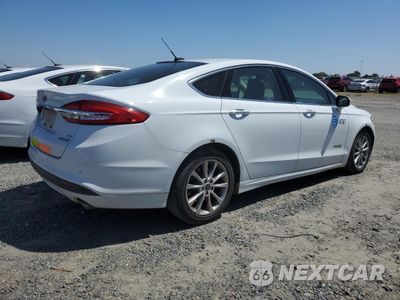 Trzecie zdjęcie samochodu z tyłu: 2017 FORD FUSION SE HYBRID VIN:3FA6P0LU8HR359540 - miniatura
