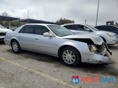 Czwarte zdjęcie samochodu z boku: 2010 CADILLAC DTS VIN:1G6KA5EY0AU118516 - miniatura