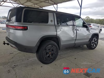 Trzecie zdjęcie samochodu z tyłu: 2023 RIVIAN R1S ADVENTURE VIN:7PDSGABA2PN006517 - miniatura