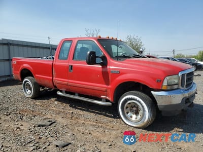 Czwarte zdjęcie samochodu z boku: 2002 FORD F350 SRW SUPER DUTY VIN:1FTSX31L52EA18479 - miniatura