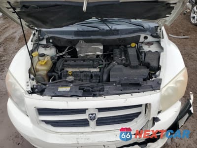 Zdjęcie 11 z 12 samochodu: 2010 DODGE CALIBER SXT VIN:1B3CB4HA2AD571559 - miniatura