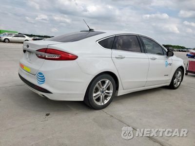 Trzecie zdjęcie samochodu z tyłu: 2018 FORD FUSION SE HYBRID VIN:3FA6P0LU2JR171652 - miniatura