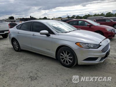 Czwarte zdjęcie samochodu z boku: 2017 FORD FUSION SE HYBRID VIN:3FA6P0LU3HR319690 - miniatura