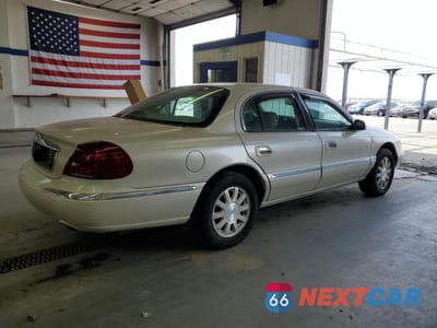 Trzecie zdjęcie samochodu z tyłu: 1999 LINCOLN CONTINENTAL VIN:1LNHM97V9XY667718 - miniatura