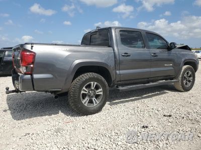 Trzecie zdjęcie samochodu z tyłu: 2019 TOYOTA TACOMA DOUBLE CAB VIN:3TMAZ5CN5KM110833 - miniatura