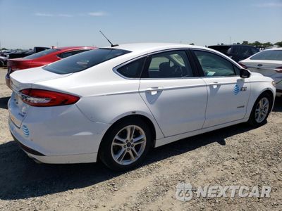 Trzecie zdjęcie samochodu z tyłu: 2018 FORD FUSION SE HYBRID VIN:3FA6P0LU7JR171551 - miniatura
