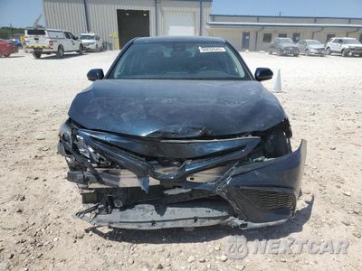 Piąte zdjęcie samochodu w środku: 2021 TOYOTA CAMRY SE VIN:4T1G11AK0MU428968 - miniatura