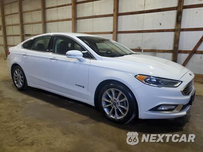 Czwarte zdjęcie samochodu z boku: 2017 FORD FUSION SE HYBRID VIN:3FA6P0LU6HR410128 - miniatura
