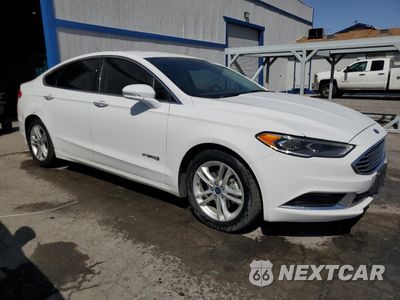 Czwarte zdjęcie samochodu z boku: 2018 FORD FUSION SE HYBRID VIN:3FA6P0LU7JR171601 - miniatura