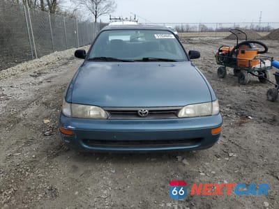 Piąte zdjęcie samochodu w środku: 1994 TOYOTA COROLLA LE VIN:1NXAE09B0SZ297630 - miniatura