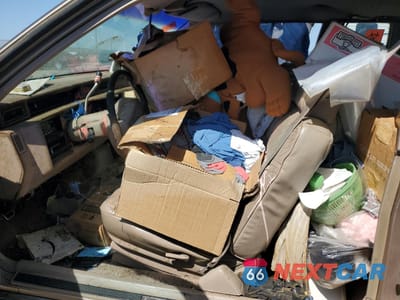 Zdjęcie 7 z 11 samochodu: 1990 CADILLAC DEVILLE VIN:1G6CD1332L4210550 - miniatura