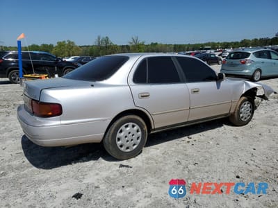Trzecie zdjęcie samochodu z tyłu: 1995 TOYOTA CAMRY LE VIN:4T1SK12E1SU492613 - miniatura