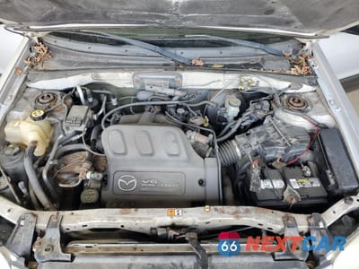 Zdjęcie 12 z 13 samochodu: 2004 MAZDA TRIBUTE LX VIN:4F2CZ94184KM13725 - miniatura