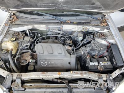 Zdjęcie 12 z 13 samochodu: 2004 MAZDA TRIBUTE LX VIN:4F2CZ94184KM13725 - miniatura