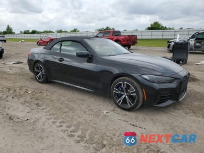 Czwarte zdjęcie samochodu z boku: 2022 BMW M440I VIN:WBA53AT01NCJ92448 - miniatura