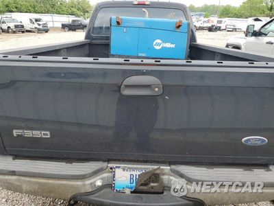 Zdjęcie 6 z 13 samochodu: 1999 FORD F350 SUPER DUTY VIN:1FTWW32F2XEA97386 - miniatura