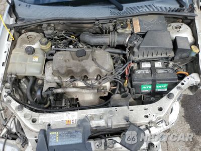 Zdjęcie 13 z 15 samochodu: 2004 FORD FOCUS LX VIN:1FAFP33PX4W132594 - miniatura