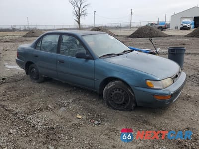 Czwarte zdjęcie samochodu z boku: 1994 TOYOTA COROLLA LE VIN:1NXAE09B0SZ297630 - miniatura