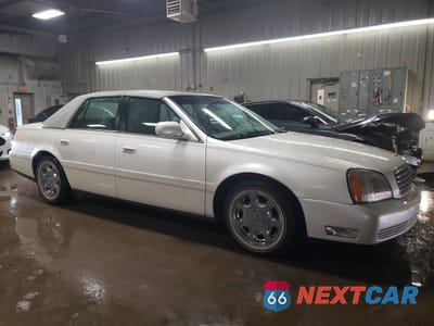 Czwarte zdjęcie samochodu z boku: 2002 CADILLAC DEVILLE VIN:1G6KD54Y32U285706 - miniatura