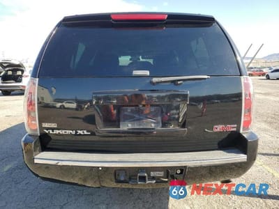 Zdjęcie 6 z 13 samochodu: 2010 GMC YUKON XL DENALI VIN:1GKUKMEF1AR279363 - miniatura