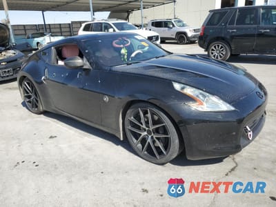 Czwarte zdjęcie samochodu z boku: 2009 NISSAN 370Z VIN:JN1AZ44E79M409869 - miniatura