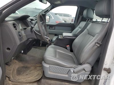 Zdjęcie 7 z 12 samochodu: 2014 FORD F150 VIN:1FTMF1CM4EKE73559 - miniatura