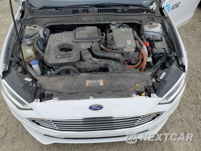 Zdjęcie 11 z 13 samochodu: 2018 FORD FUSION SE HYBRID VIN:3FA6P0LU5JR118881 - miniatura