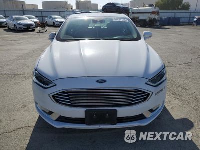 Piąte zdjęcie samochodu w środku: 2017 FORD FUSION SE HYBRID VIN:3FA6P0LU4HR400732 - miniatura