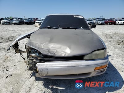 Piąte zdjęcie samochodu w środku: 1995 TOYOTA CAMRY LE VIN:4T1SK12E1SU492613 - miniatura