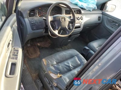 Zdjęcie 8 z 13 samochodu: 2002 HONDA ODYSSEY EXL VIN:2HKRL18952H551358 - miniatura