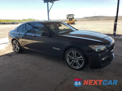 Czwarte zdjęcie samochodu z boku: 2014 BMW 750 XI VIN:WBAYB6C51ED224639 - miniatura