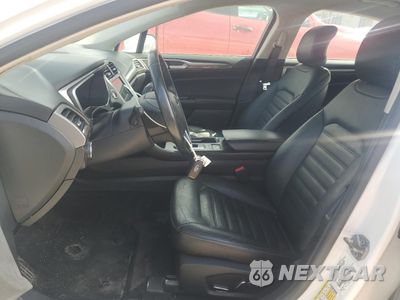Zdjęcie 7 z 13 samochodu: 2017 FORD FUSION SE HYBRID VIN:3FA6P0LU5HR409102 - miniatura