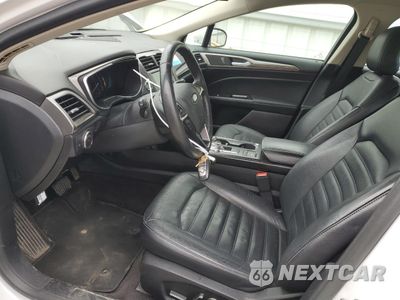 Zdjęcie 7 z 13 samochodu: 2017 FORD FUSION SE HYBRID VIN:3FA6P0LU9HR359627 - miniatura