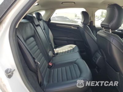 Zdjęcie 10 z 12 samochodu: 2018 FORD FUSION SE HYBRID VIN:3FA6P0LU2JR163499 - miniatura