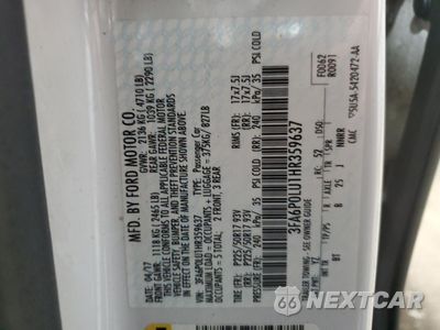 Zdjęcie 12 z 13 samochodu: 2017 FORD FUSION SE HYBRID VIN:3FA6P0LU1HR359637 - miniatura