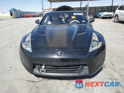 Piąte zdjęcie samochodu w środku: 2009 NISSAN 370Z VIN:JN1AZ44E79M409869 - miniatura