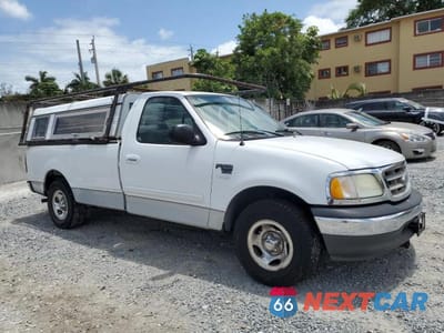 Czwarte zdjęcie samochodu z boku: 2003 FORD F150 VIN:2FTRF17W03CA55647 - miniatura