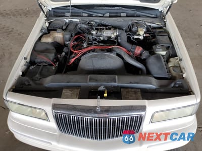 Zdjęcie 11 z 12 samochodu: 1996 LINCOLN TOWN CAR CARTIER VIN:1LNLM83W7TY640188 - miniatura