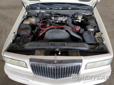 Zdjęcie 11 z 12 samochodu: 1996 LINCOLN TOWN CAR CARTIER VIN:1LNLM83W7TY640188 - miniatura