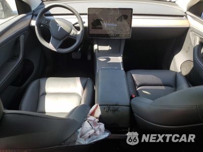 Zdjęcie 8 z 14 samochodu: 2023 TESLA MODEL Y VIN:7SAYGDEE5PA189136 - miniatura