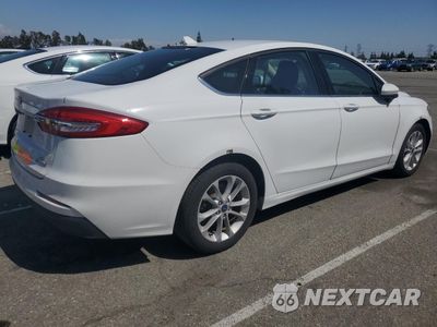 Trzecie zdjęcie samochodu z tyłu: 2019 FORD FUSION SE VIN:3FA6P0LU1KR263966 - miniatura