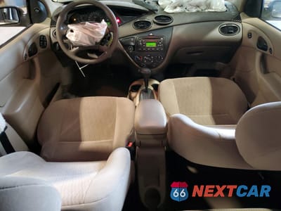 Zdjęcie 8 z 15 samochodu: 2000 FORD FOCUS SE VIN:1FAHP36P7YW219878 - miniatura