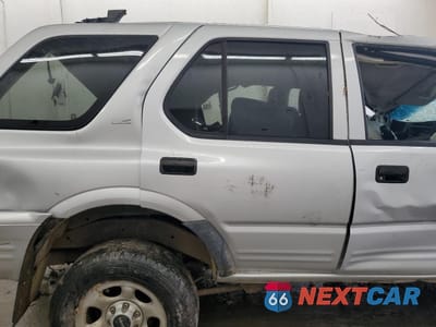 Zdjęcie 11 z 13 samochodu: 2002 ISUZU RODEO S VIN:4S2DM58W924331185 - miniatura